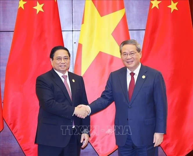Thủ tướng Chính phủ Phạm Minh Chính và Thủ tướng Quốc vụ viện Trung Quốc Lý Cường.