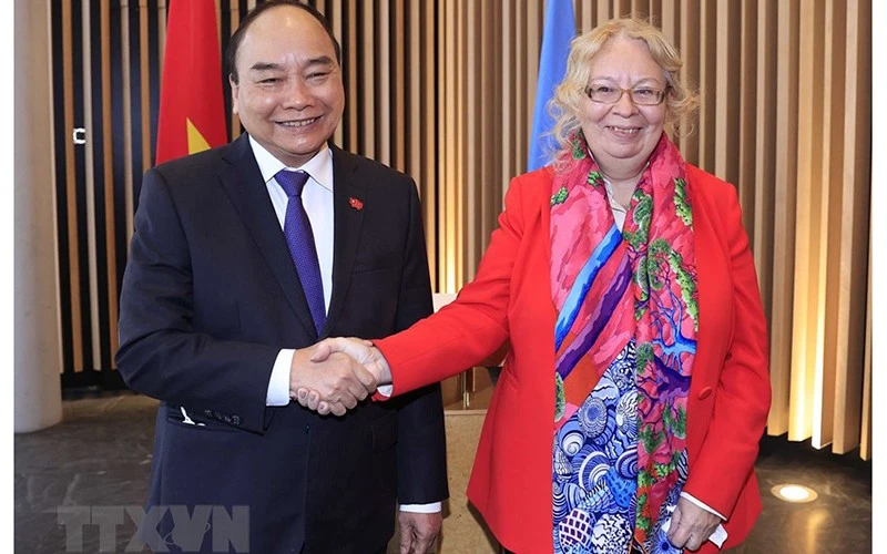 Chủ tịch nước Nguyễn Xuân Phúc gặp Tổng Giám đốc Văn phòng Liên hợp quốc tại Geneva ảnh 1