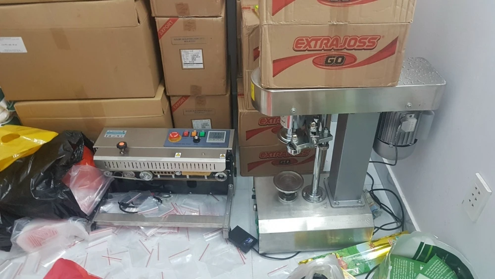 Máy mà các đối tượng dùng đóng gói nước vui.