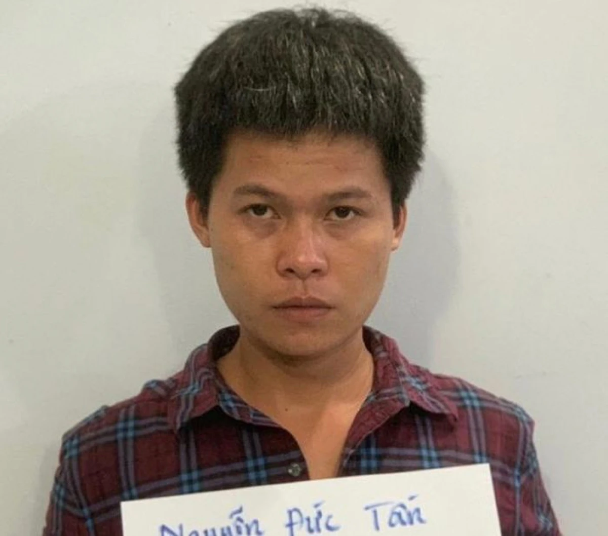 Đối tượng Nguyễn Đức Tấn tại cơ quan công an.